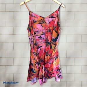 NWT. Women’s floral wrap romper. Size 16.